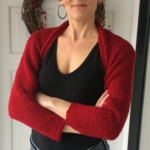 The happy knitter and her simple knit shrug.