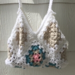 crocheted granny squares in the sunshine