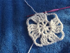 Round 2 closes with a sl st to the top of ch-4