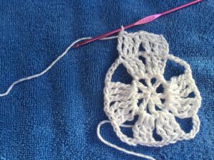 ch-4, tc in same space, tc in next 2 tc, ch-1, tc in next 2 tc, ch-1, tc in next 2 tc, tc2tog in next tc