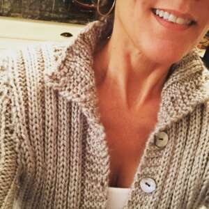 Closeup of buttons on the sweater.