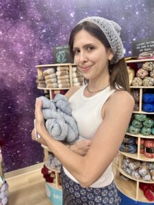 Joanie models the Granny Bandana while cradling Malabrigo Sock :)