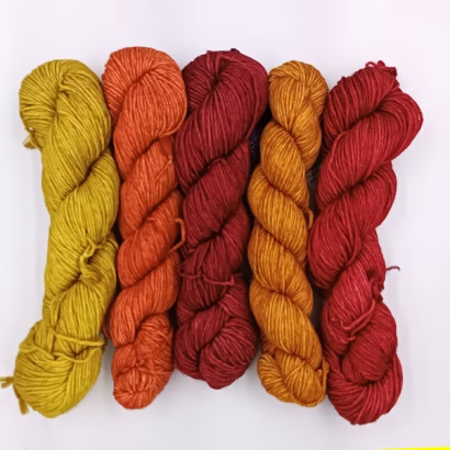 Set 2 – Ravelry Red, Sunset, Cereza, Glazed Carrot, Frank Ochre A bold, fiery spectrum radiating energy and warmth—ideal for statement scarves or colorwork accents.