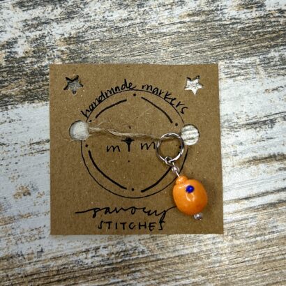 Handmade Sumo Mandarin Stitch Marker by Savory Stitches